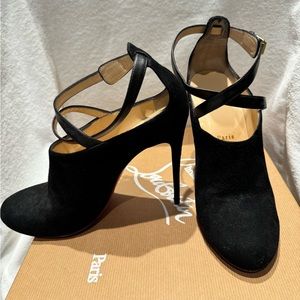Black suede Christian Louboutin heels